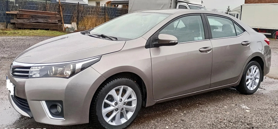 Toyota Corolla cena 49999 przebieg: 128000, rok produkcji 2015 z Warszawa małe 154